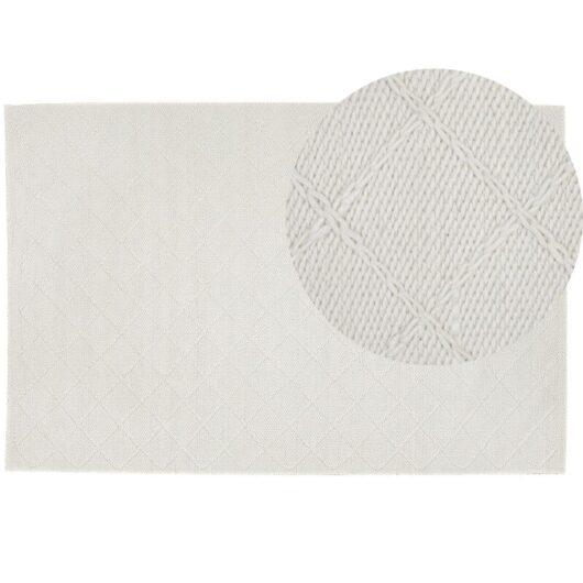 Beliani - Handmade Wool Blend Rug Knitted Living Room Decor 140x200 cm Off-White Ellek
