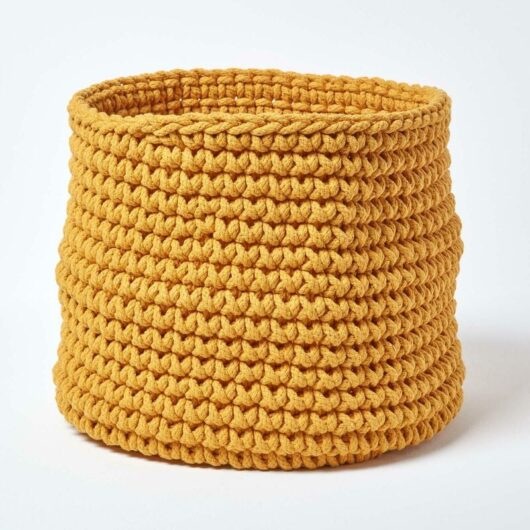 Homescapes - Yellow Cotton Knitted Round Storage Basket, 42 x 37 cm