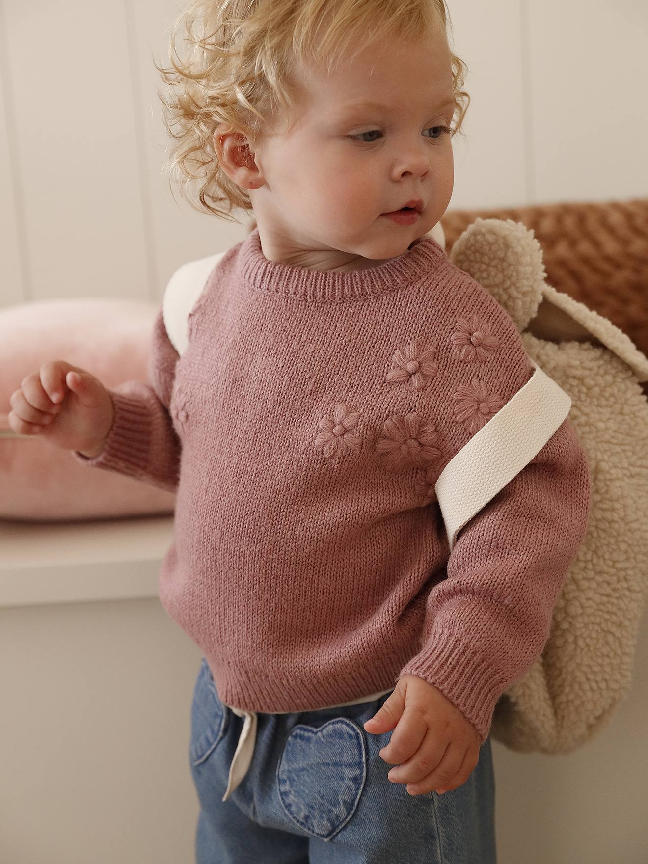 Knitted jumper for babies with embroidered flowers rose