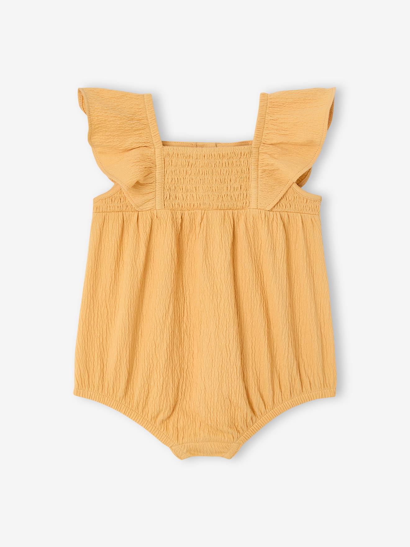 Baby girl sleepsuit in organic cotton mustard