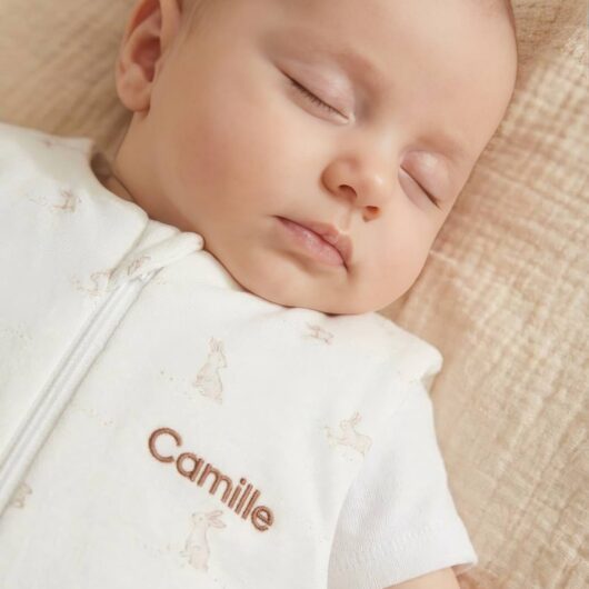 Sleeveless Sleeping Bag with Central Opening in Organic Cotton for Babies, LAPIN AOP printed white